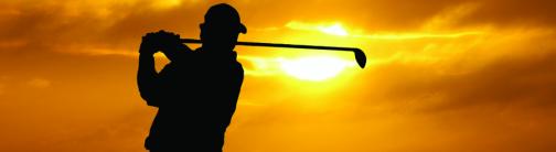 CI037-GOLFER AT SUNSET